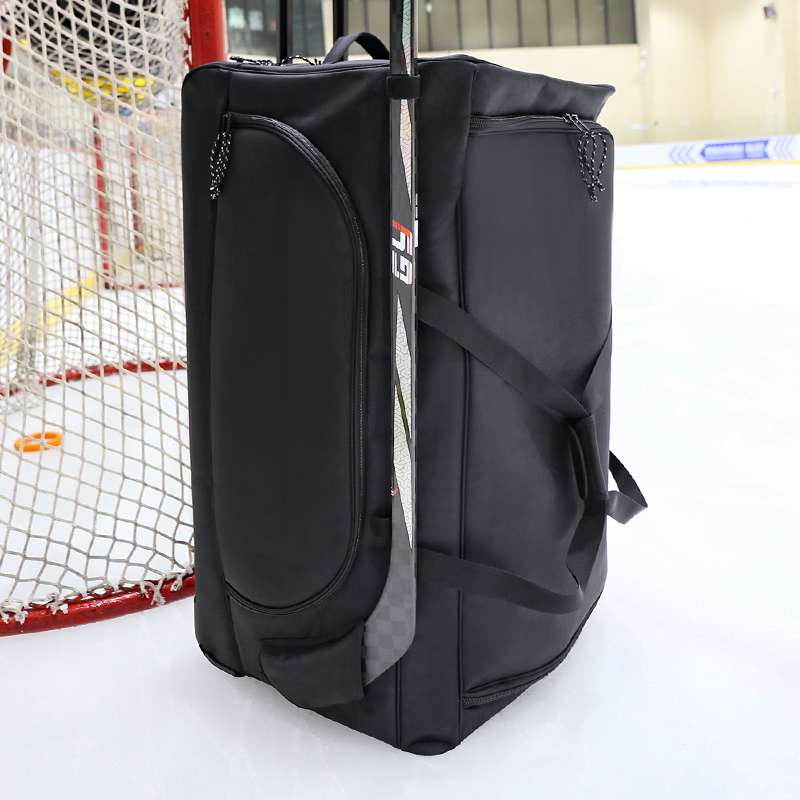 Vlastní taška s velkým hokejovým zařízením s koly
